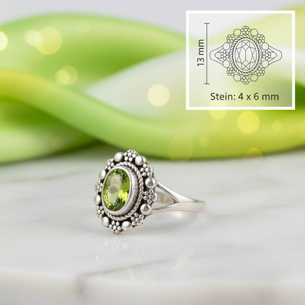 Peridotring aus Silber mit Maßangaben zu Ring und Edelstein