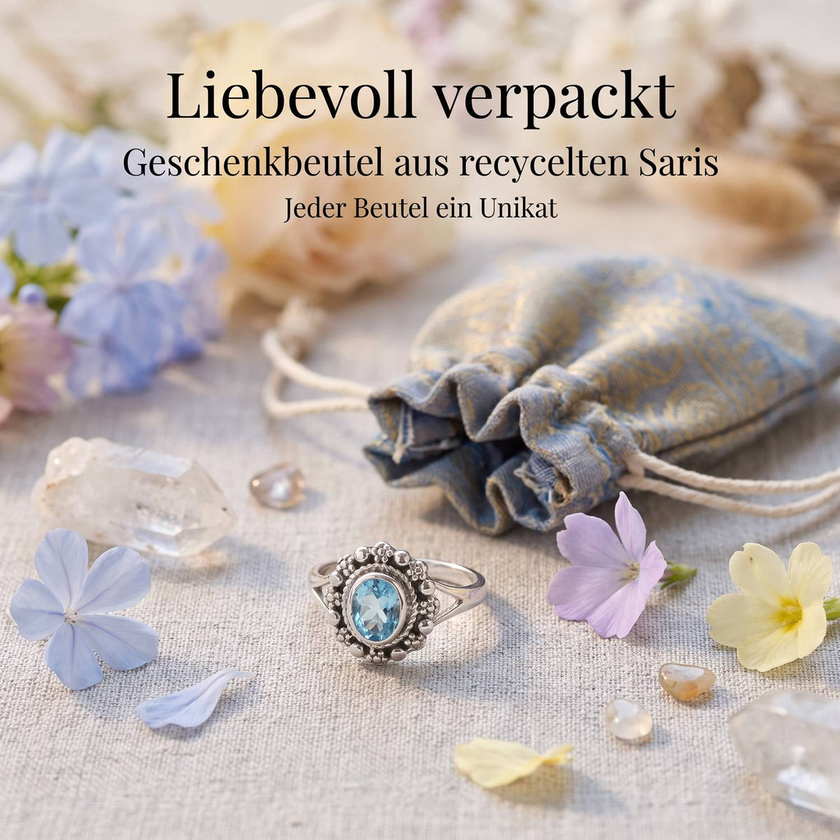 Silberring mit Topas und Geschenkbeutel aus recyceltem Sari