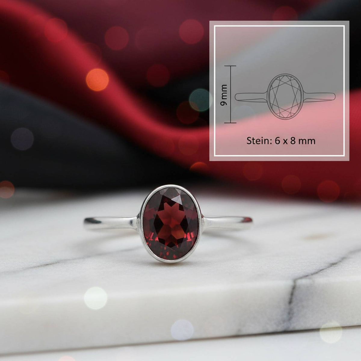 Granatring aus Silber mit Maßangaben zu Ring und Edelstein