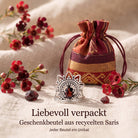 [KI] Silberring mit Granat und Geschenkbeutel aus recyceltem Sari