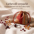 [KI] Silberring mit Granat und Geschenkbeutel aus recyceltem Sari