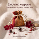 [KI] Silberring mit Granat und Geschenkbeutel aus recyceltem Sari