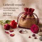 [KI] Silberring mit Granat und Geschenkbeutel aus recyceltem Sari