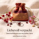 [KI] Silberring mit Granat und Geschenkbeutel aus recyceltem Sari