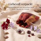 [KI] Silberring mit Granat und Geschenkbeutel aus recyceltem Sari