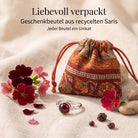 [KI] Silberring mit Granat und Geschenkbeutel aus recyceltem Sari