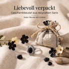 [KI] Silberring mit Onyx und Geschenkbeutel aus recyceltem Sari