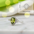[KI] Peridotring aus Silber mit Maßangaben zu Ring und Edelstein