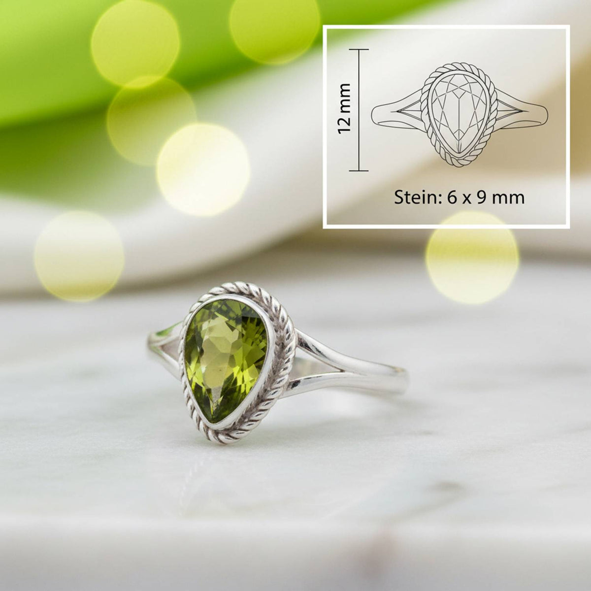 Peridotring aus Silber mit Maßangaben zu Ring und Edelstein