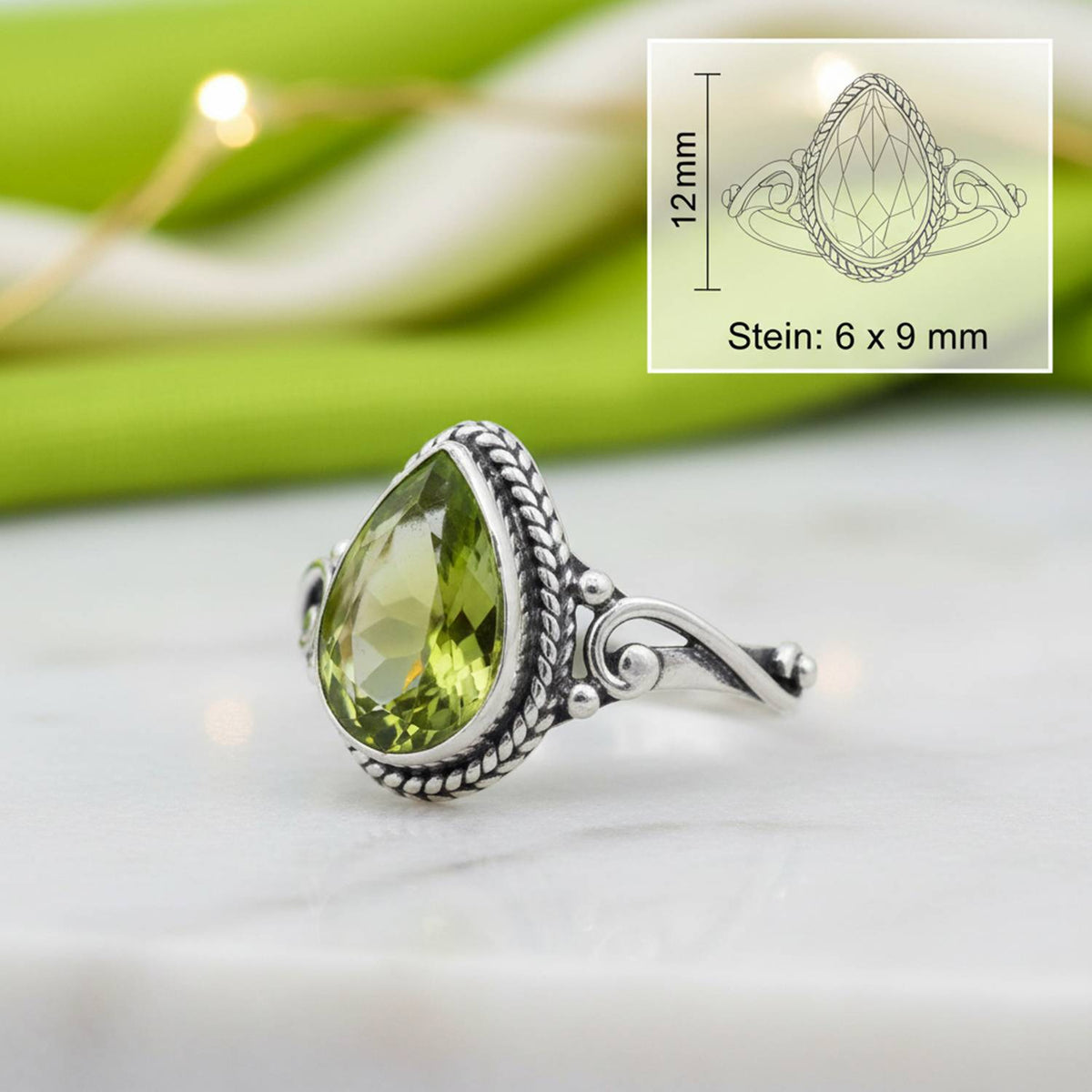 Peridotring aus Silber mit Maßangaben zu Ring und Edelstein