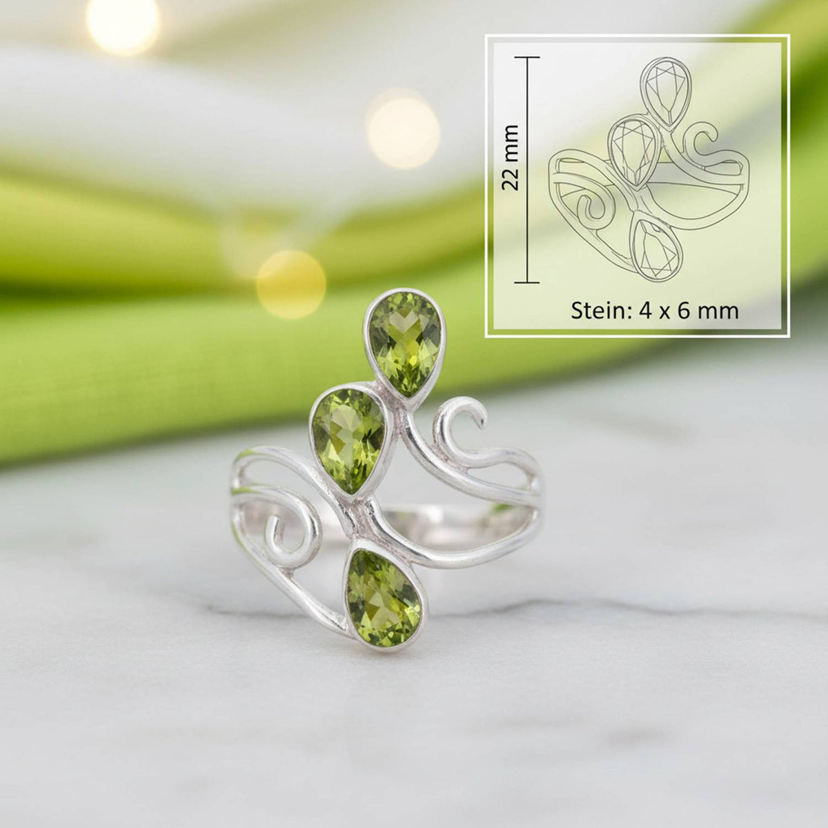 Peridotring aus Silber mit Maßangaben zu Ring und Edelstein