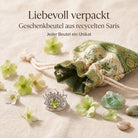 [KI] Silberring mit Peridot und Geschenkbeutel aus recyceltem Sari