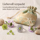 [KI] Silberring mit Peridot und Geschenkbeutel aus recyceltem Sari