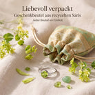 [KI] Silberring mit Peridot und Geschenkbeutel aus recyceltem Sari
