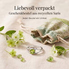 [KI] Silberring mit Peridot und Geschenkbeutel aus recyceltem Sari