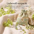 [KI] Silberring mit Peridot und Geschenkbeutel aus recyceltem Sari