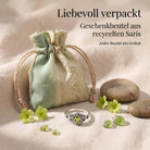 [KI] Silberring mit Peridot und Geschenkbeutel aus recyceltem Sari