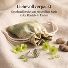 [KI] Silberring mit Peridot und Geschenkbeutel aus recyceltem Sari