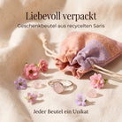 [KI] Silberring mit Rosenquarz und Geschenkbeutel aus recyceltem Sari