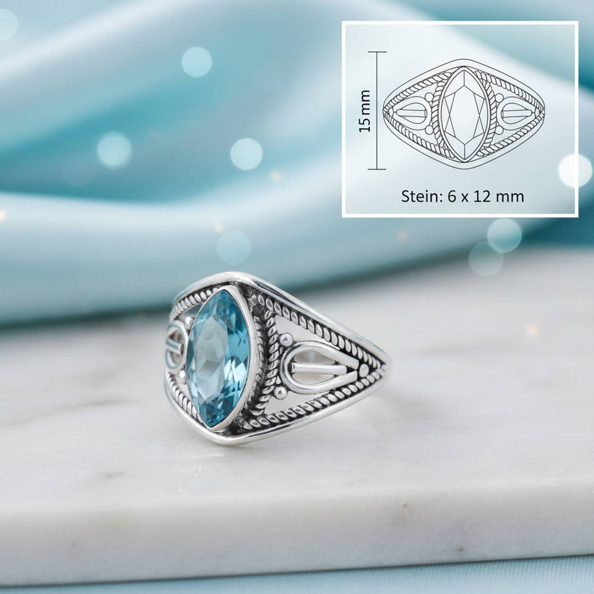 Topasring aus Silber mit Maßangaben zu Ring und Edelstein