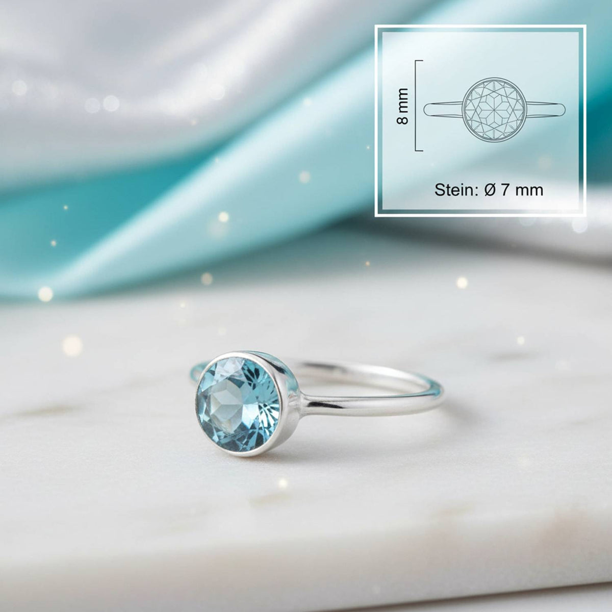 Topasring aus Silber mit Maßangaben zu Ring und Edelstein