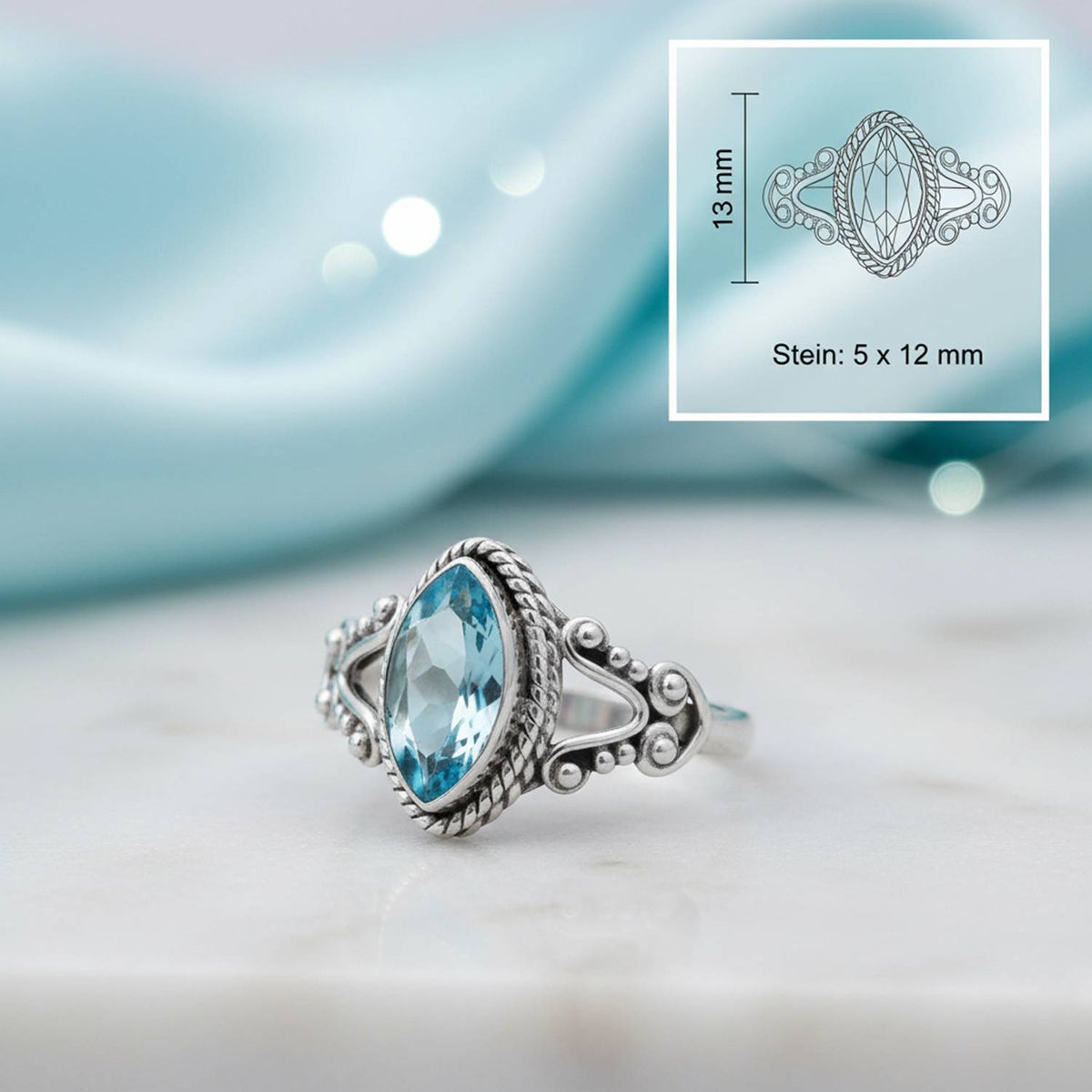 Topasring aus Silber mit Maßangaben zu Ring und Edelstein