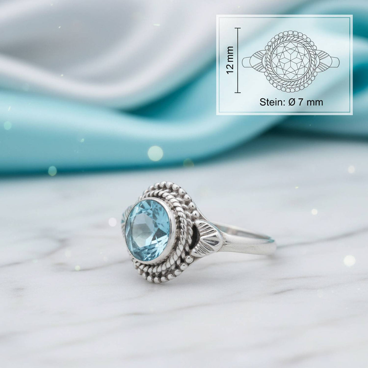 Topasring aus Silber mit Maßangaben zu Ring und Edelstein