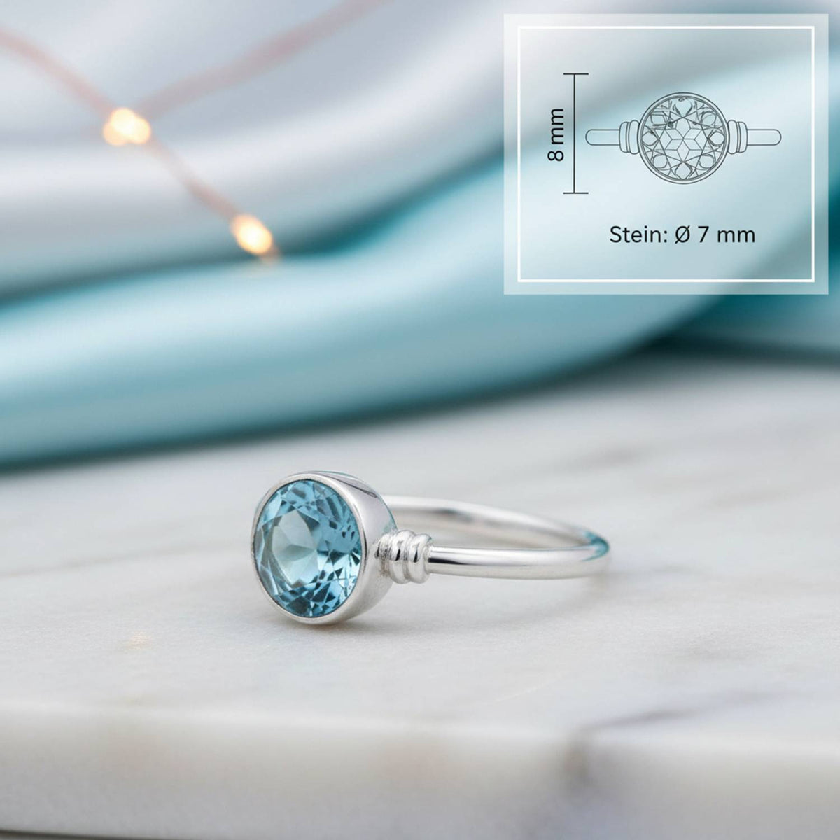 Topasring aus Silber mit Maßangaben zu Ring und Edelstein