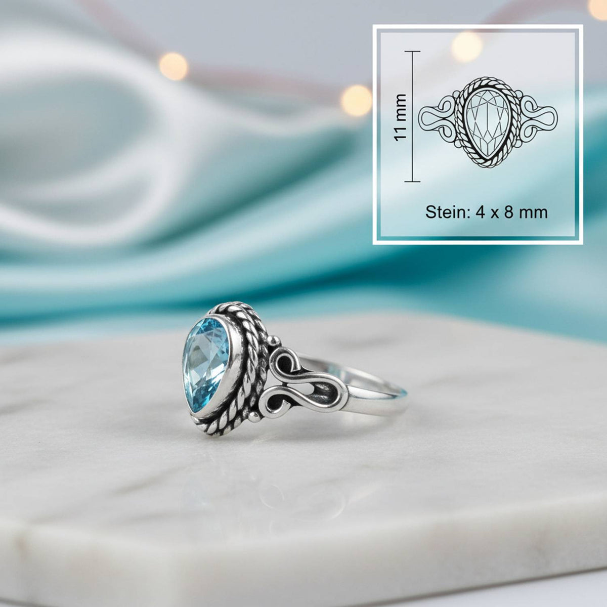 Topasring aus Silber mit Maßangaben zu Ring und Edelstein