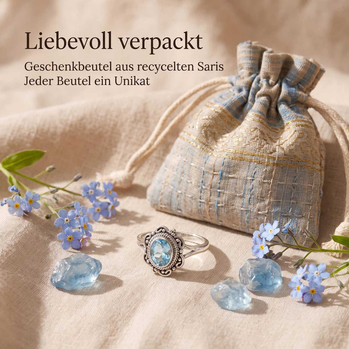 Silberring mit Topas und Geschenkbeutel aus recyceltem Sari