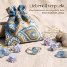 [KI] Silberring mit Topas und Geschenkbeutel aus recyceltem Sari