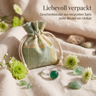 [KI] Silberring mit grüner Onyx und Geschenkbeutel aus recyceltem Sari